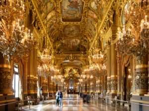 Explore the opulent golden interiors of Palais Garnier in Paris, France.
